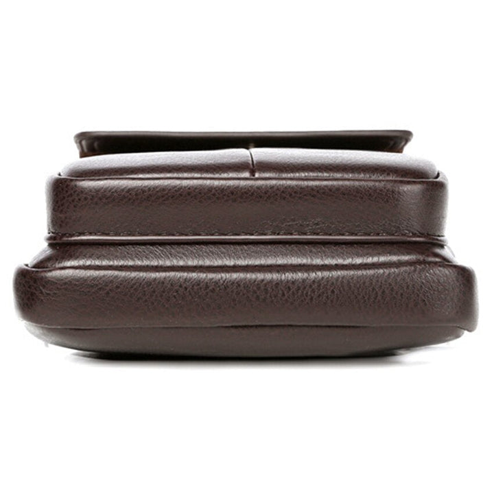 Modern men's compact PU leather crossbody bag, sleek design, adjustable strap, travel-friendly.