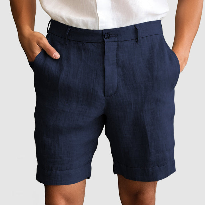 Men's tailored cuffed flat front chino dress shorts, ideal for warm weather and summer fashion.