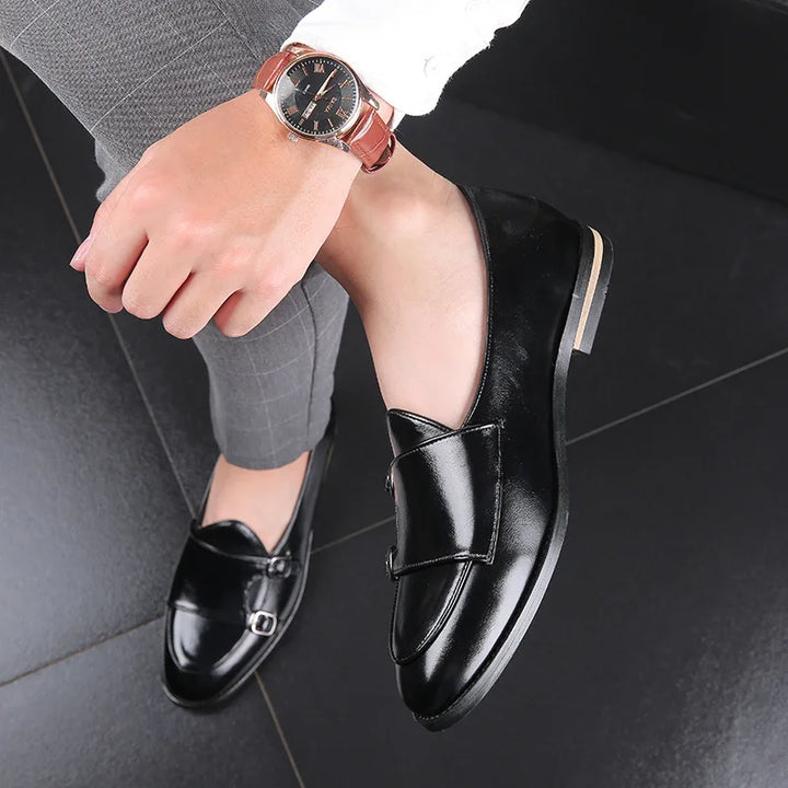 Pair of classic men's double monk strap loafers, polished leather finish