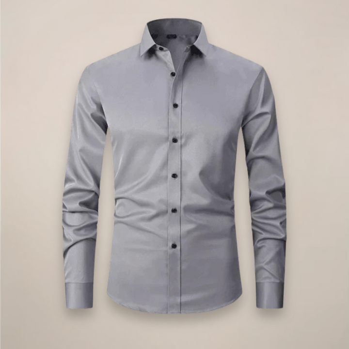 Detail of the stitching on a men's everyday tailored button-up shirt, ensuring durability.