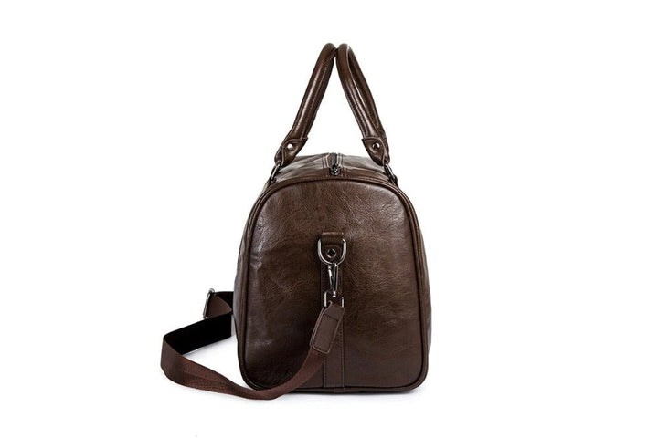 Large men's faux leather travel duffel, a spacious & durable weekender bag.