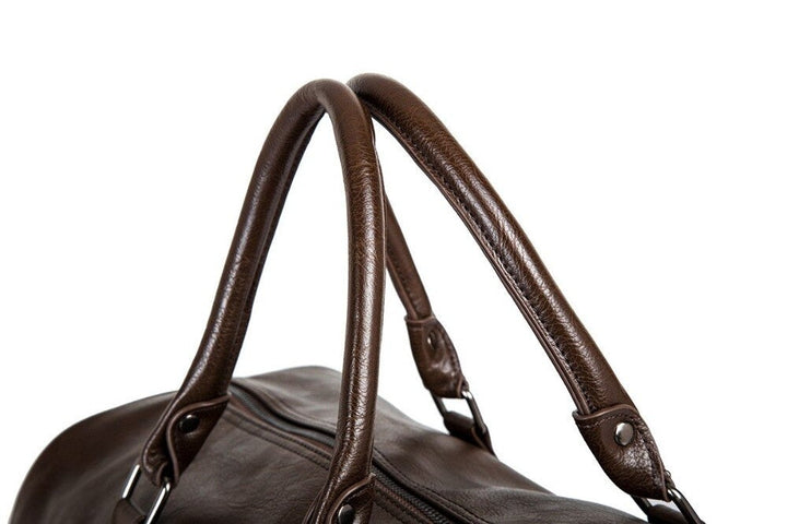 Premium faux leather men's duffel, large capacity travel bag for all your gear.