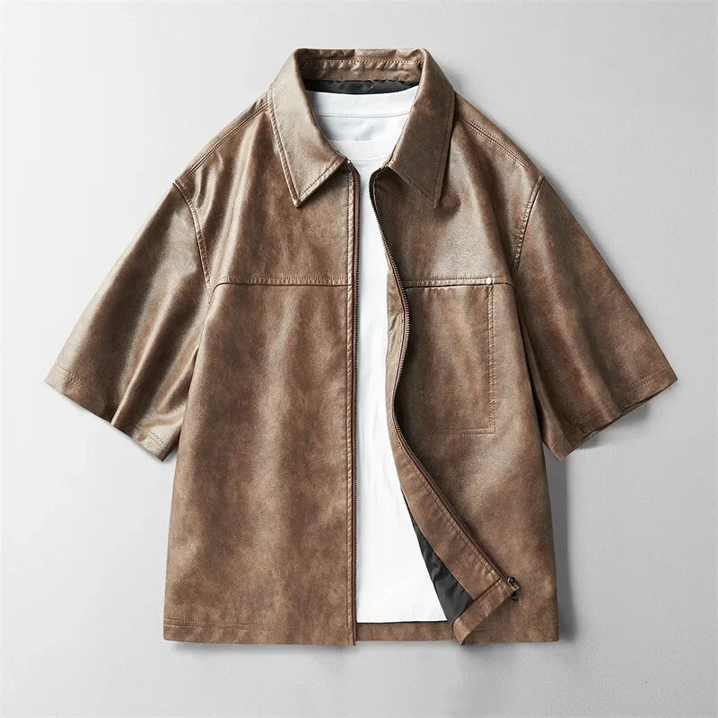Wrinkle-resistant men's short-sleeve leather shirt in black, offering a sharp and effortless look.
