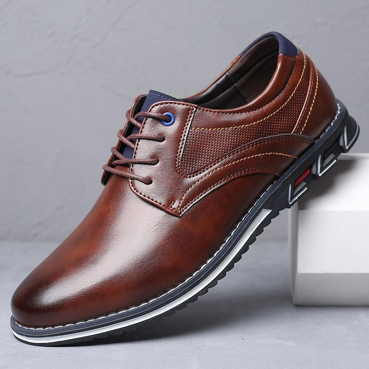 Close-up of the lace-up detail on men's casual anti-slip walking shoes, comfortable footwear