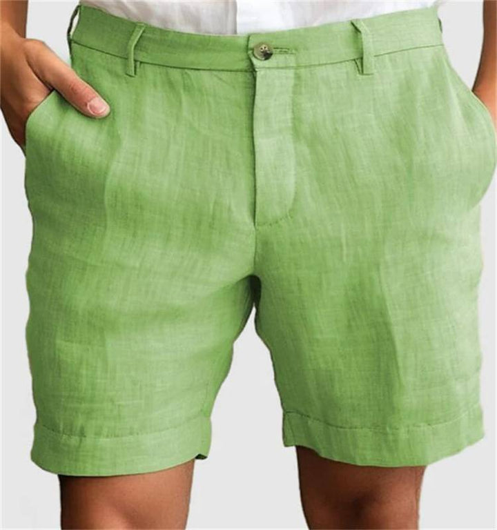 Man wearing relaxed fit lightweight summer shorts. Perfect casual style for warm weather & everyday comfort.
