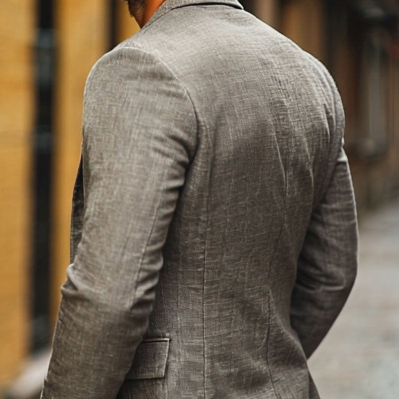 Men's slim fit single-breasted lightweight blazer. Perfect for warm weather, business casual events, and summer wedding attire.