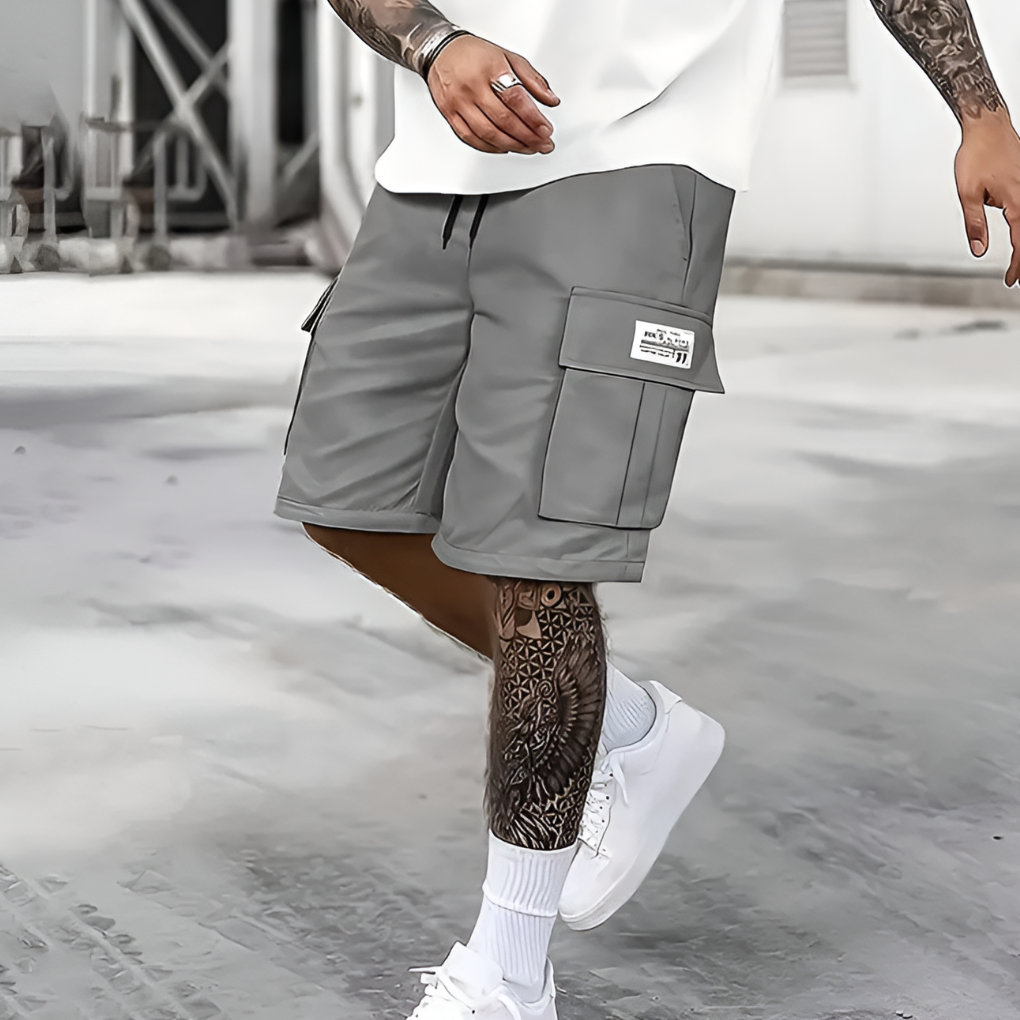 Men's loose fit cargo shorts, elastic waist, knee-length for summer comfort. Ideal for casual streetwear & vacation.