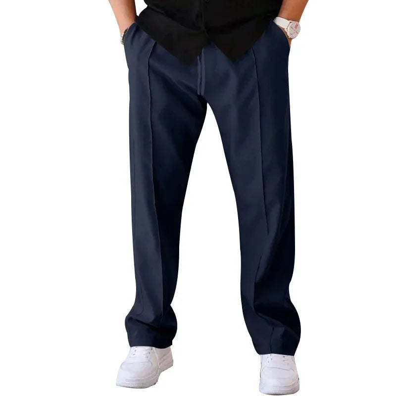 Uncreased men's loose-fit formal trousers, highlighting the smooth fabric and comfortable feel.