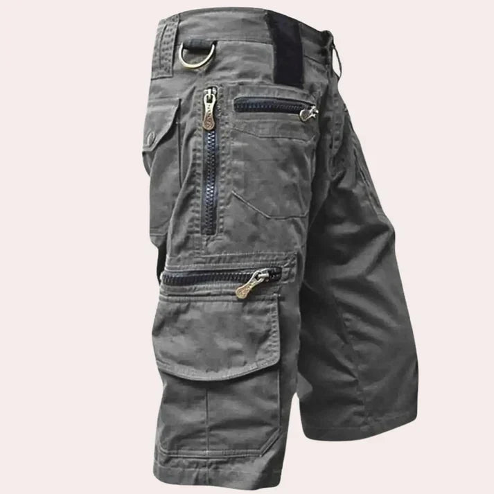 Men's multi-pocket cargo shorts, ideal for travel & outdoor adventures. Durable fabric for utility & casual wear.