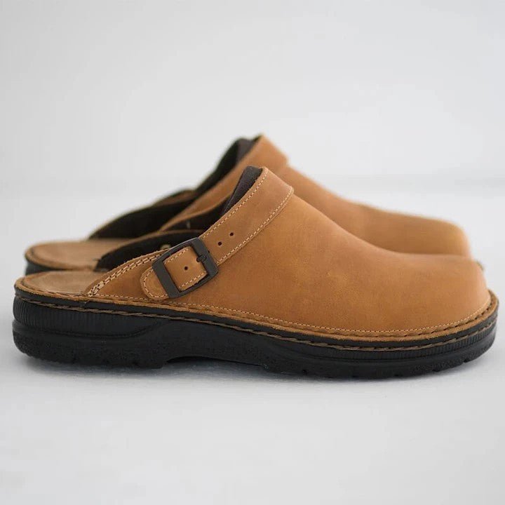Supportive men's clogs for foot pain relief. Comfortable orthopedic slip-on shoes perfect for work or casual use.