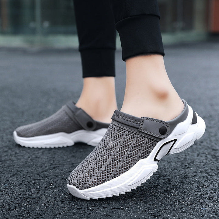 Pair of men's summer shoes highlighting the hollow-out design for ventilation.