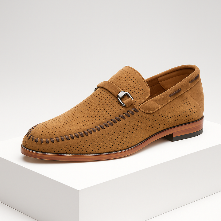 Pair of black premium suede loafers for men, showcasing the elegant perforated upper and durable sole.