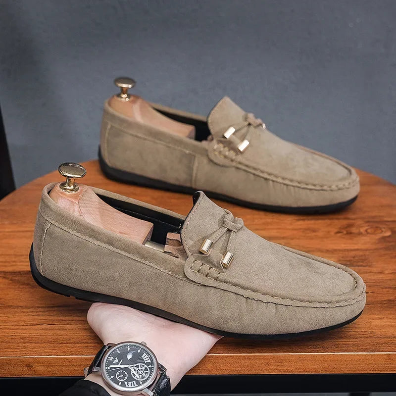 Stylish men's slip-on leather loafers in brown, offering comfort and breathability