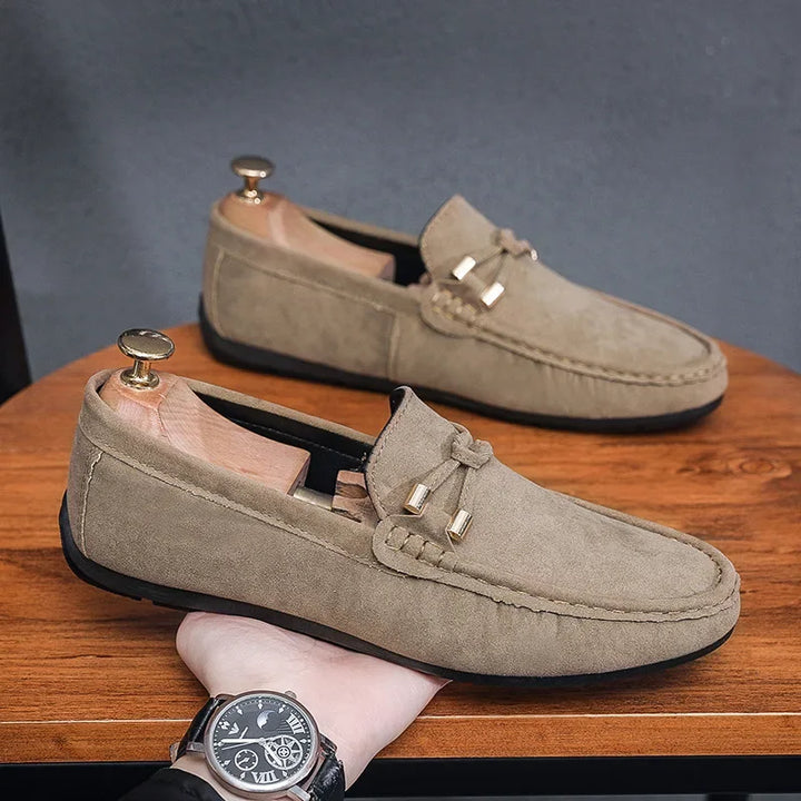 Stylish men's slip-on leather loafers in brown, offering comfort and breathability