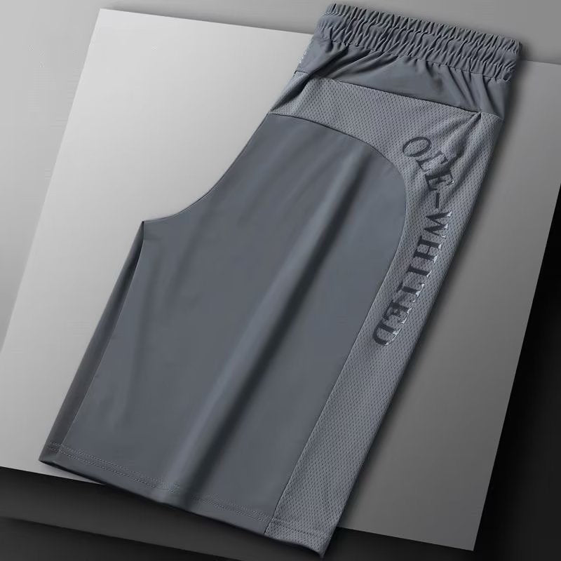 Men's sportswear shorts in a grey shade, offering a versatile option for active and casual outfits.