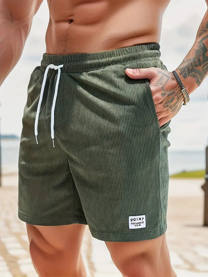 Men's quick-dry swim shorts for beachwear & pool. Sportswear comfort, elastic waist for summer fun.