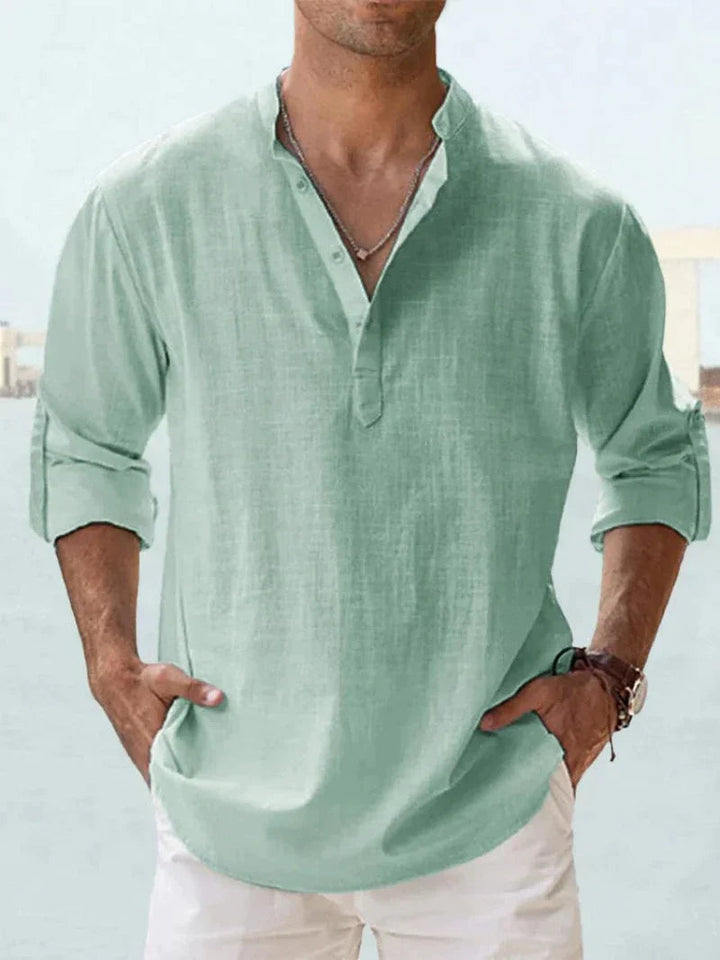 Comfortable regular fit men's long sleeve button-up shirt, ideal casual top for summer vacation.