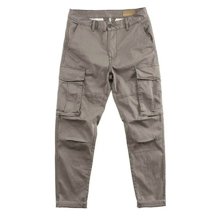 Durable men's cargo pants, cotton blend, relaxed fit with numerous pockets, perfect for utility and outdoor.