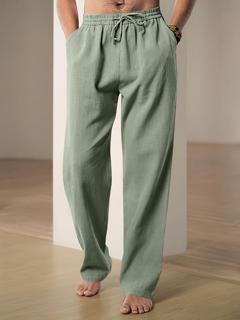 Soft men's relaxed fit pants with drawstring, ideal for spring & summer comfort and style.