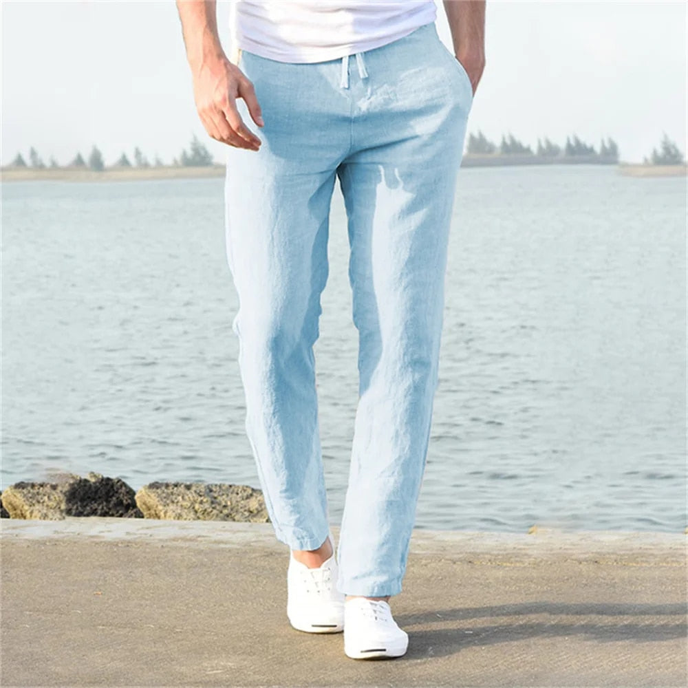 Stylish men's relaxed fit trousers, featuring an adjustable drawstring waist and functional pockets.
