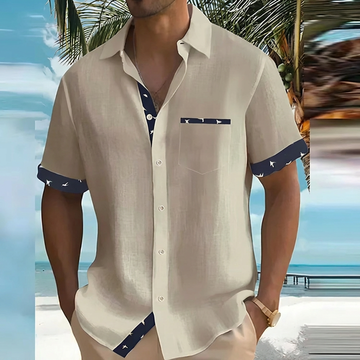 Stylish men's button-down vacation shirt, perfect for beach, resort, or effortless summer looks.