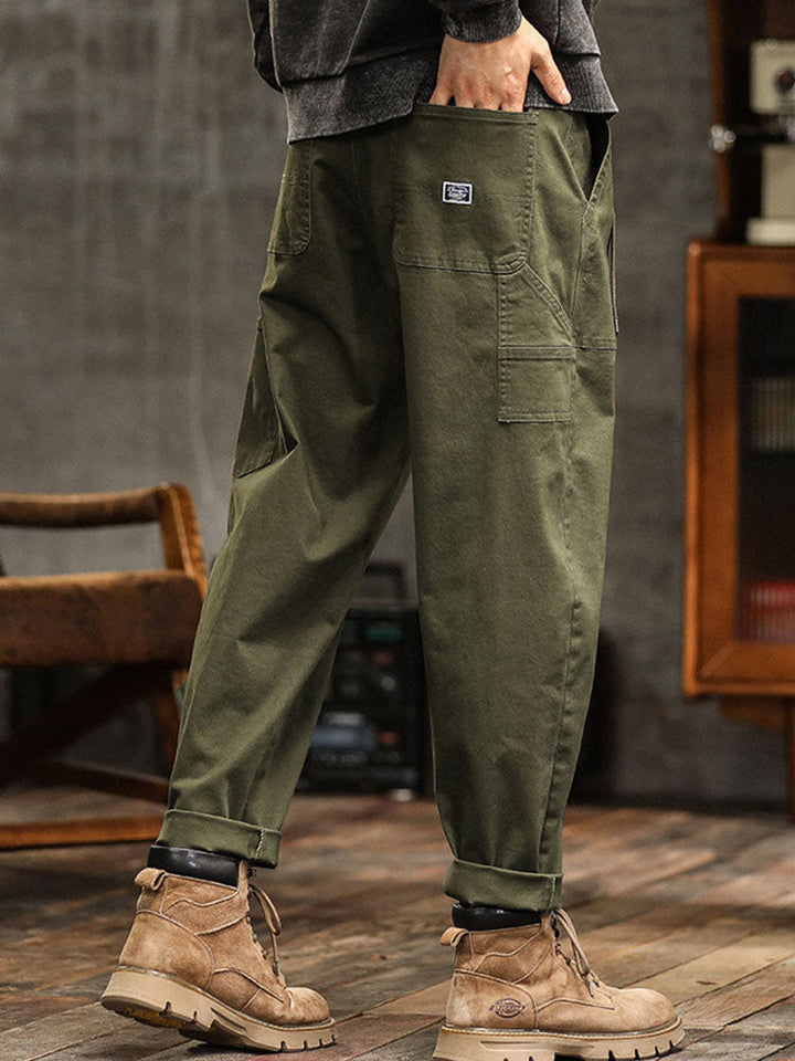 Front view of men's casual relaxed fit utility pants in a deep navy, designed for everyday comfort and style.