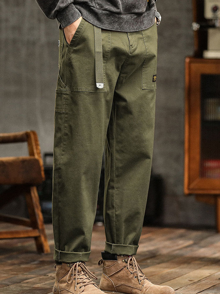 Men's relaxed fit bottoms, utility style in olive green, offering comfort and a contemporary casual look.