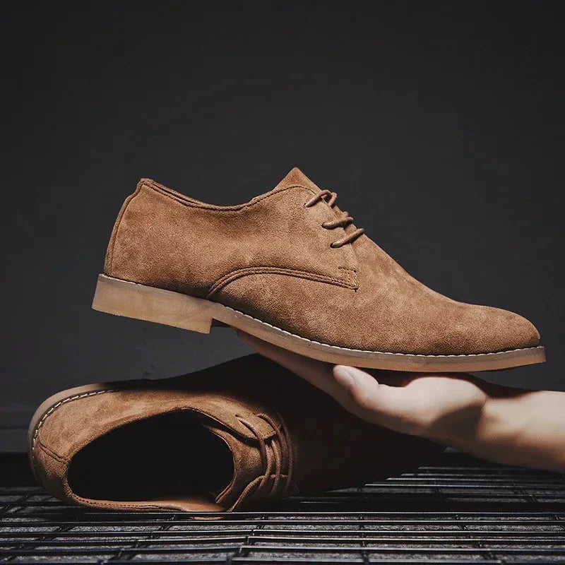 Classic men's suede oxford shoes for a timeless and sophisticated look. Comfortable formal footwear.
