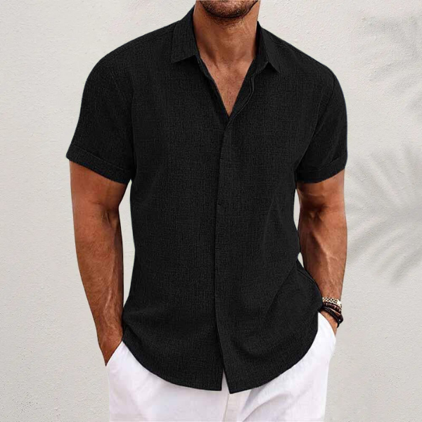 Casual men's short sleeve button-down shirt, perfect for summer beach wear & everyday comfort.