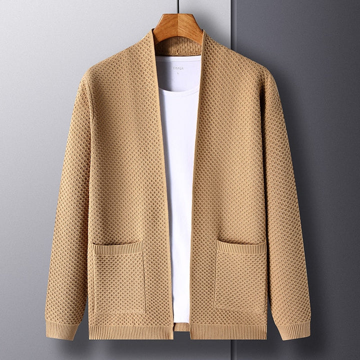 Stylish men's knitted cardigan, slim fit, with practical pockets for fall and winter fashion.