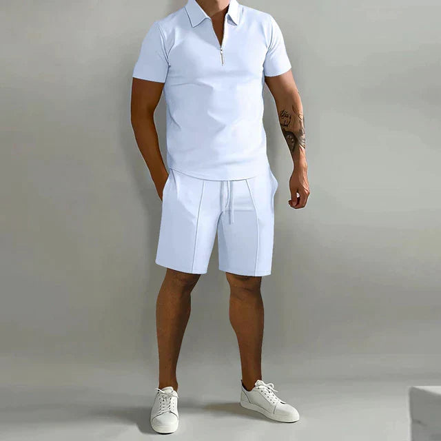 Versatile men's smart casual summer outfit: matching zippered polo shirt and drawstring shorts for ultimate comfort.