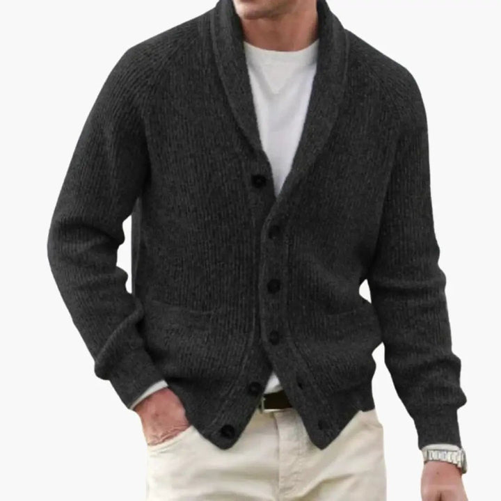 Close-up of a men's knit shawl collar cardigan with buttons, suitable for winter fashion.