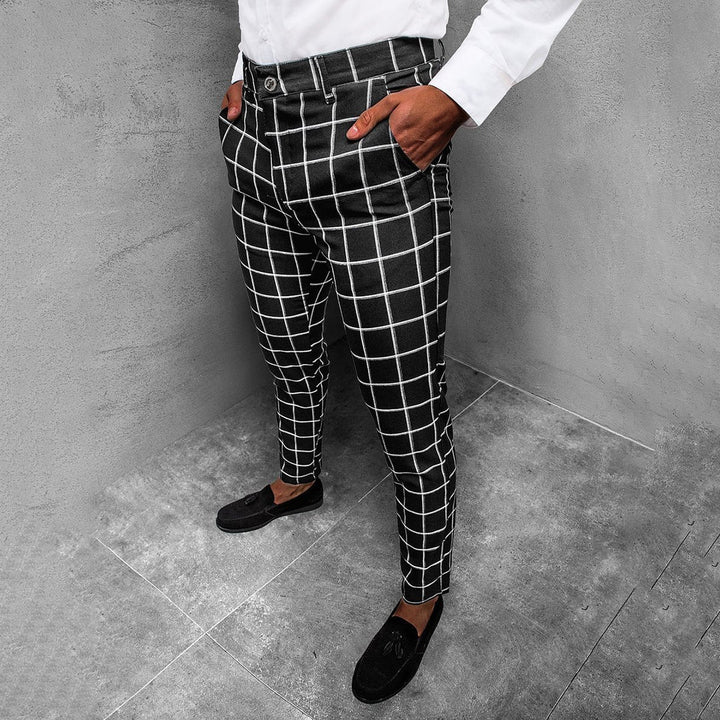 Tapered fit men's trousers with a stylish grid pattern, versatile for many occasions