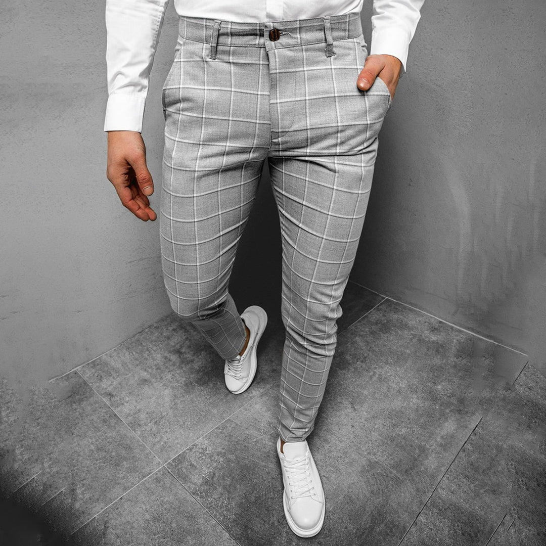 Stylish men's checked trousers with a modern tapered fit, showcasing grid pattern