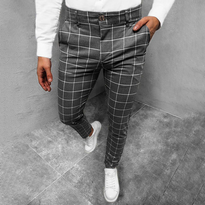 Business casual men's fashion: tapered grid pattern trousers in a classic color