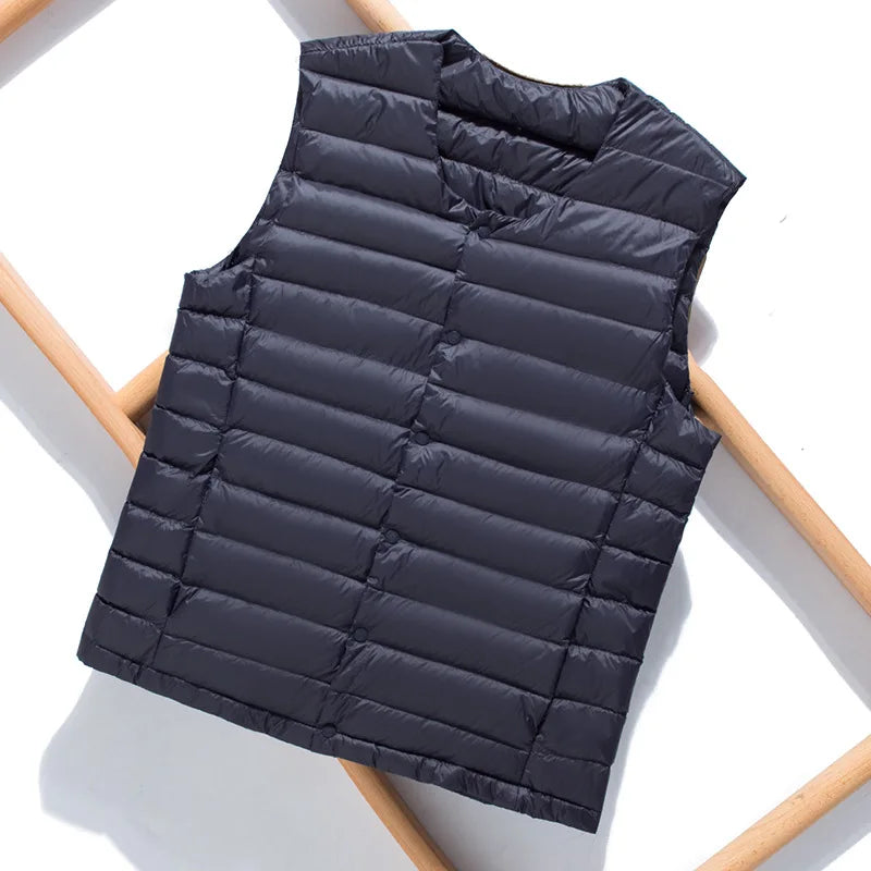 Warm men's ultralight padded vest, great for layering over shirts or under jackets. Travel-friendly outerwear.