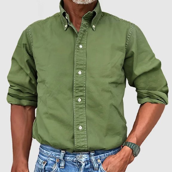 Stylish men's long sleeve button-down, vintage wash, relaxed fit, great for a modern casual aesthetic.