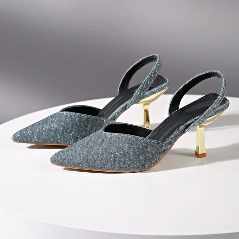 Metallic silver pointed toe slingback heels for women, perfect for special occasions