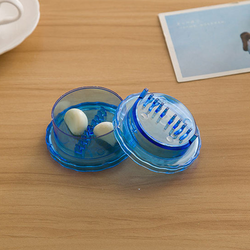 Garlic press tool with easy-to-clean design, a must-have kitchen accessory for cooking