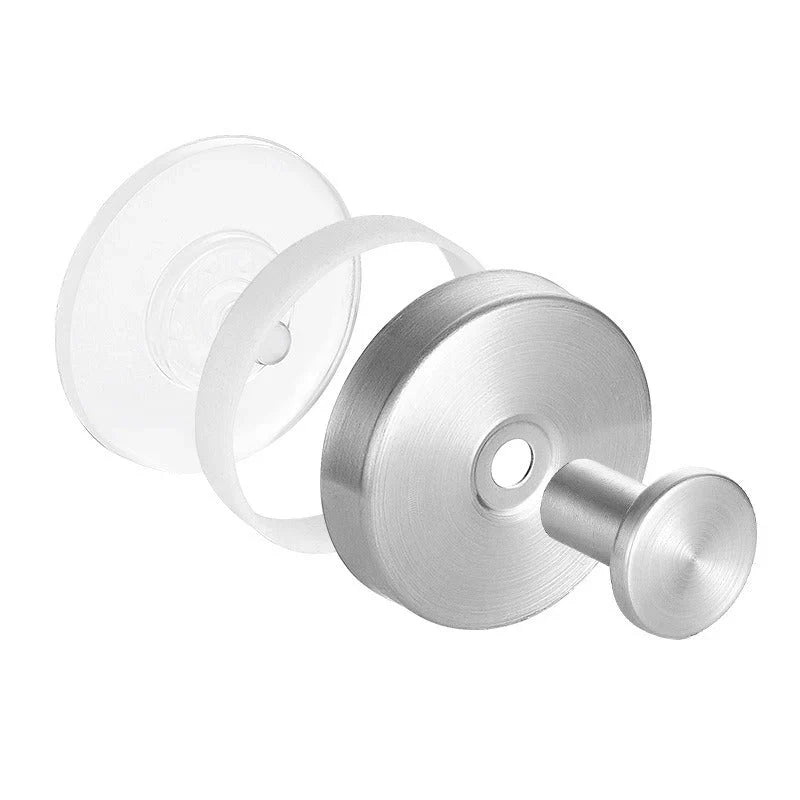 "Minimalist suction wall hooks 4-pack, no-drill installation for modern home, stylish organization, supports up to 7 kg."