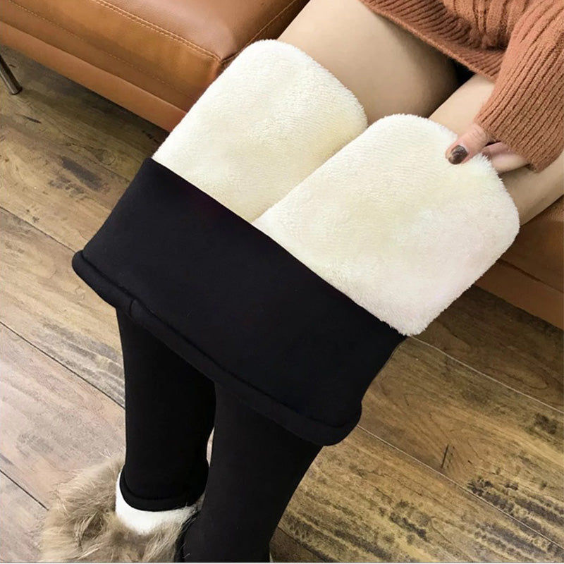 Close-up of the plush fleece lining inside women's thermal winter leggings, showing warmth and comfort