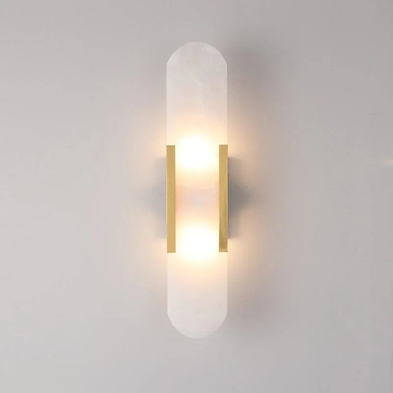 "Modern black and gold LED wall lamp with oval Lucite crystal centerpiece, ideal for dining room lighting."