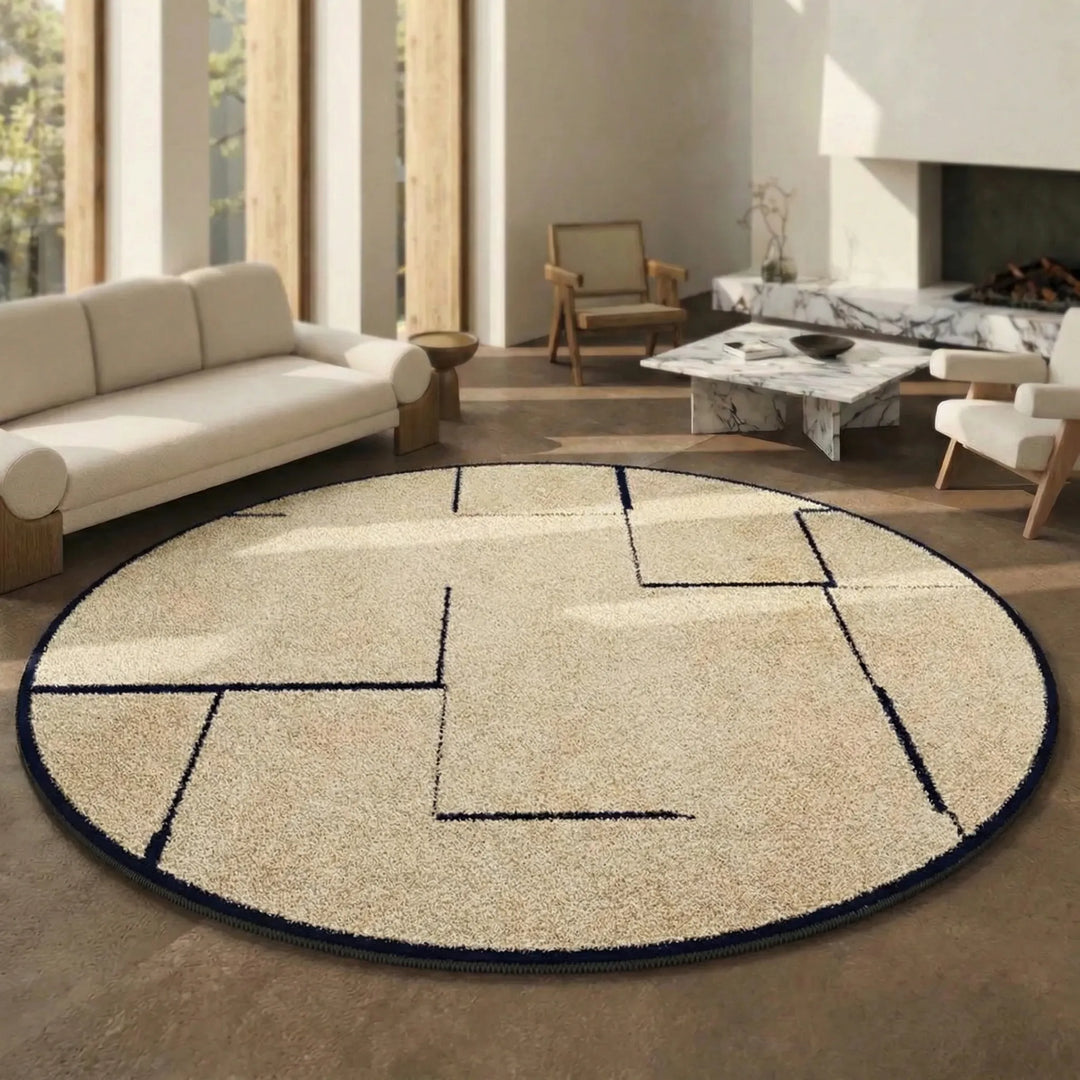 Statement round area rug with modern wave pattern, low pile and washable for contemporary home interior decor.