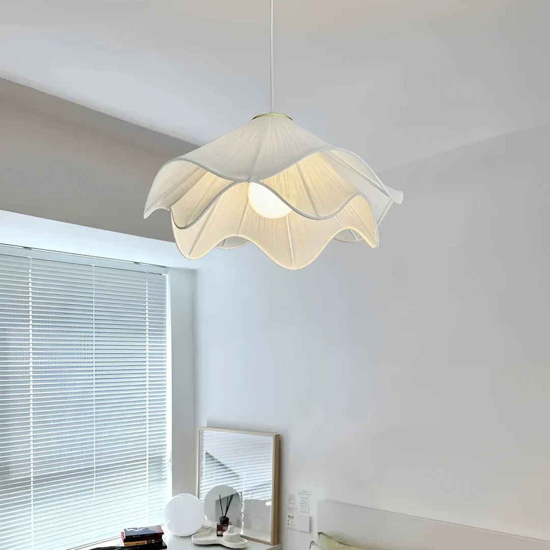 Modern white fabric flower LED pendant light with elegant design, soft glow, ideal for chic interiors, adjustable length.