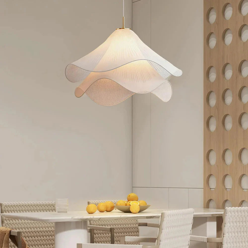 Modern white fabric flower LED pendant light with elegant design, soft glow, ideal for chic interiors, adjustable length.
