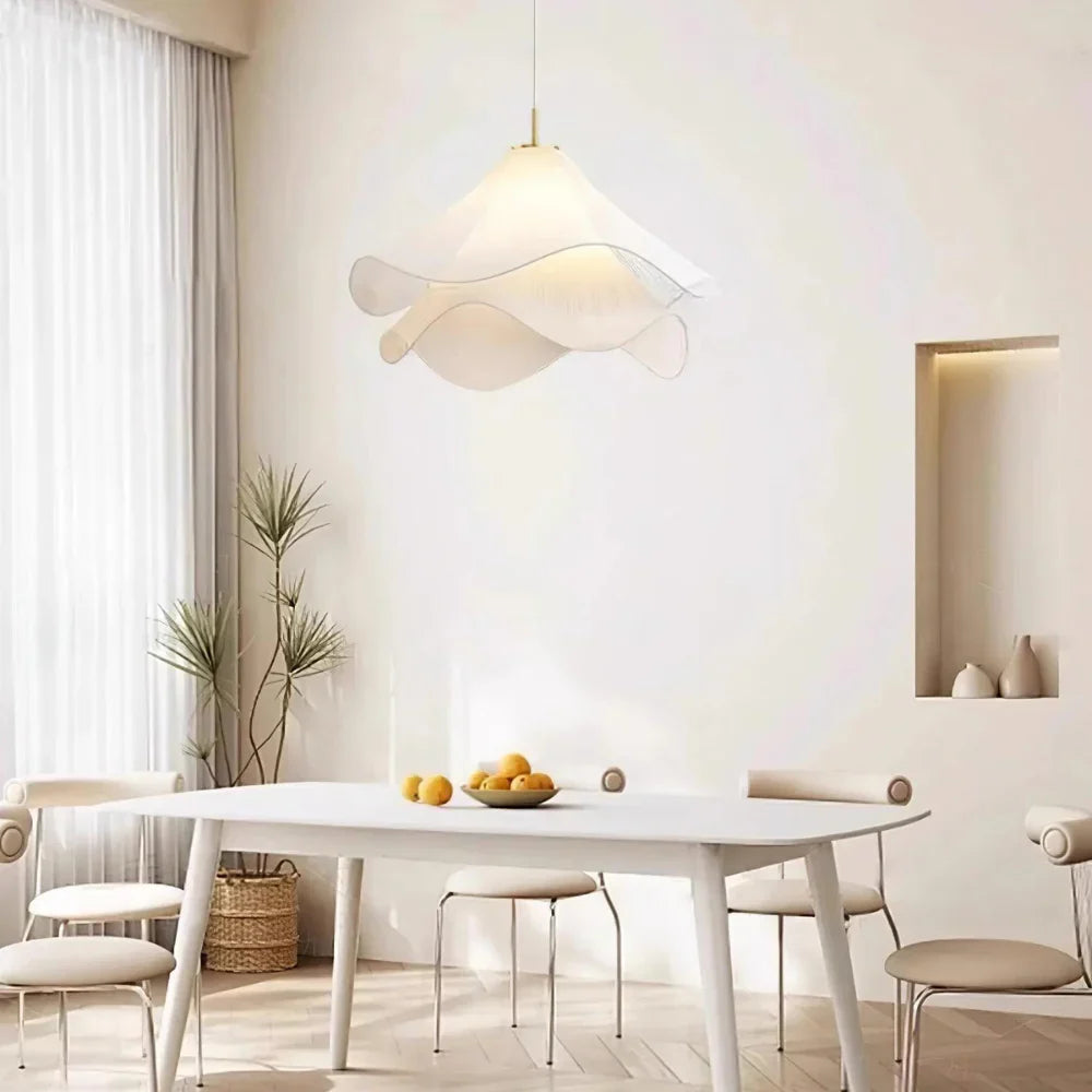 Modern white fabric flower LED pendant light with elegant design, soft glow, ideal for chic interiors, adjustable length.