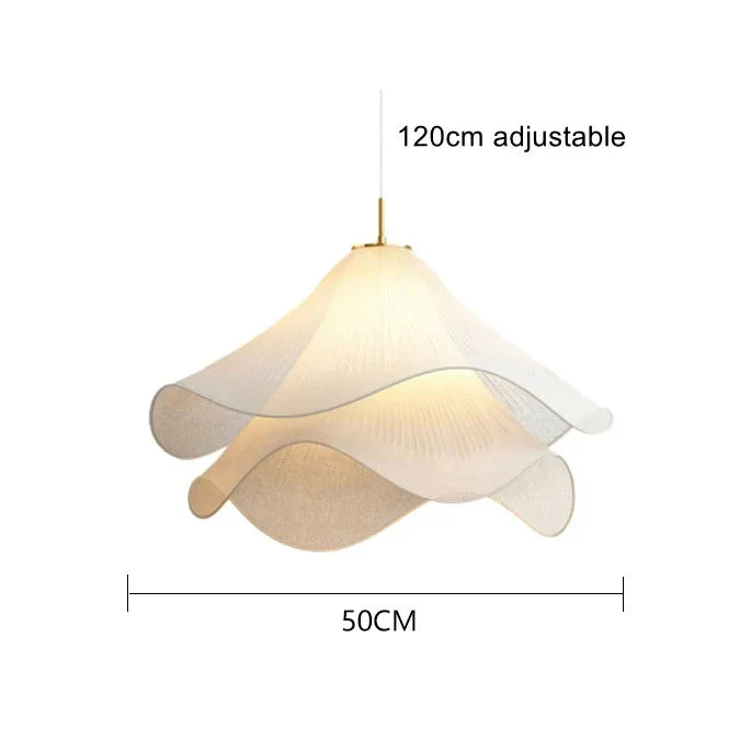 Modern white fabric flower LED pendant light with elegant design, soft glow, ideal for chic interiors, adjustable length.