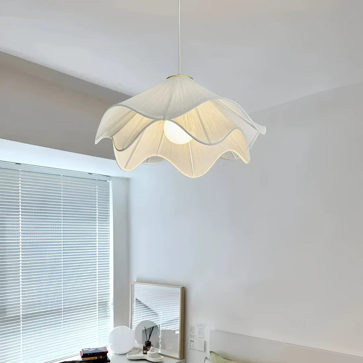 Modern white fabric flower LED pendant light with elegant design, soft glow, ideal for chic interiors, adjustable length.
