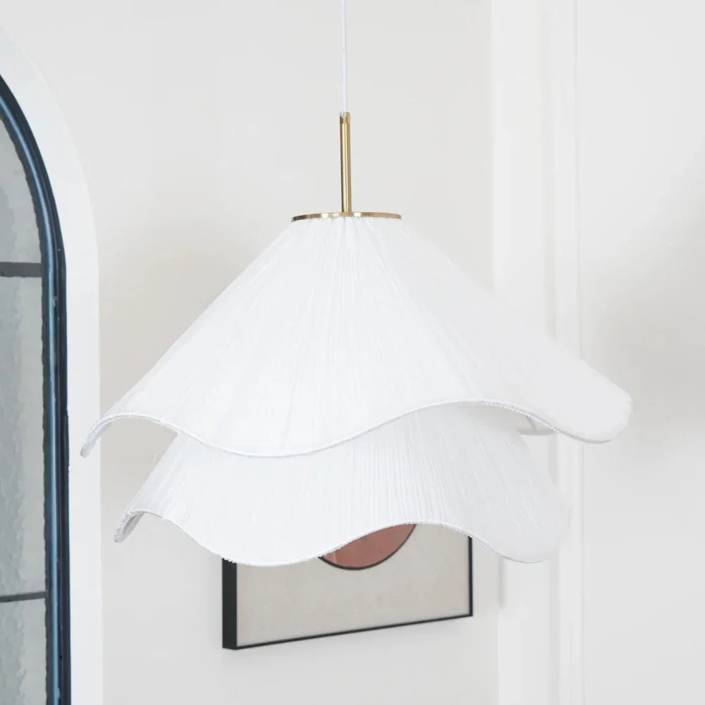 Modern white fabric flower LED pendant light with elegant design, soft glow, ideal for chic interiors, adjustable length.