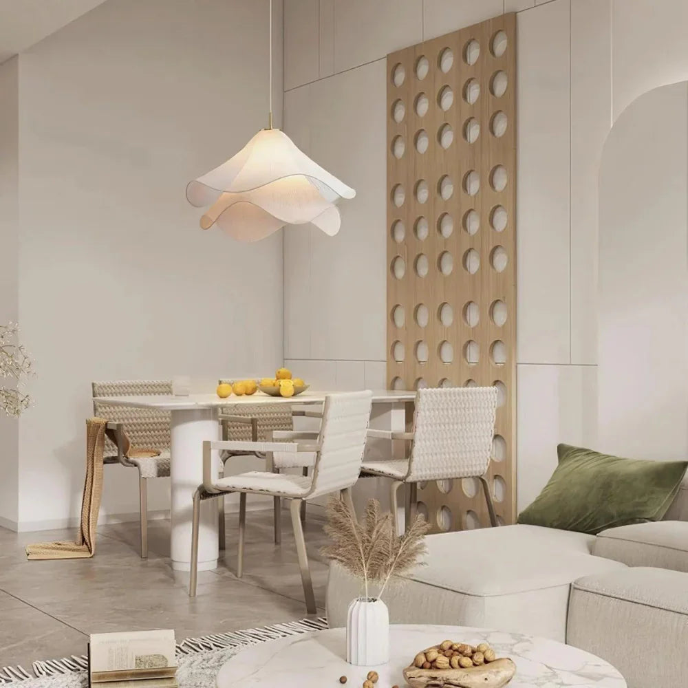 Modern white fabric flower LED pendant light with elegant design, soft glow, ideal for chic interiors, adjustable length.
